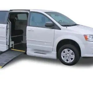 A van with the door open and ramp up.